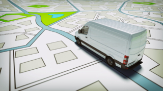 Truck on a road city map. Concept of global shipment and GPS tracking Single Vehicle Tracker