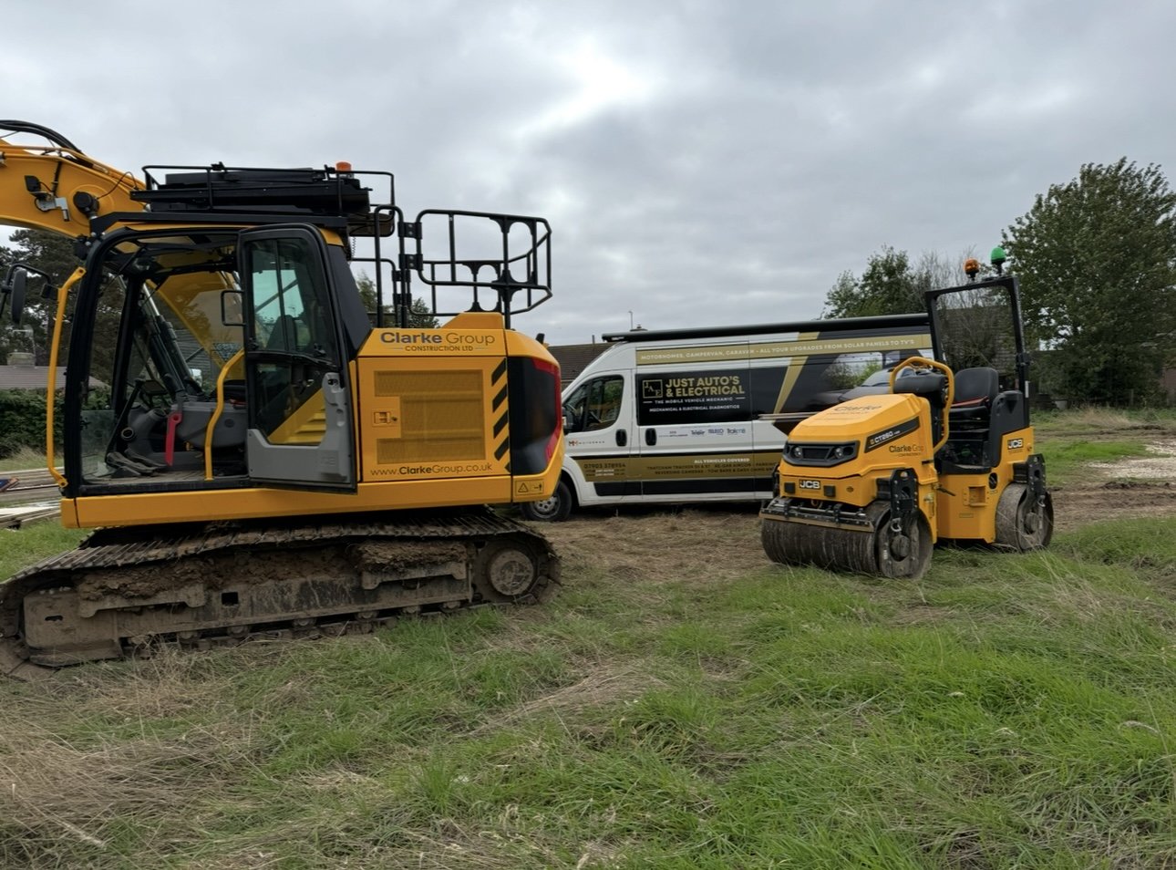Clarke Group Construction site with Just Autos & Electrical van