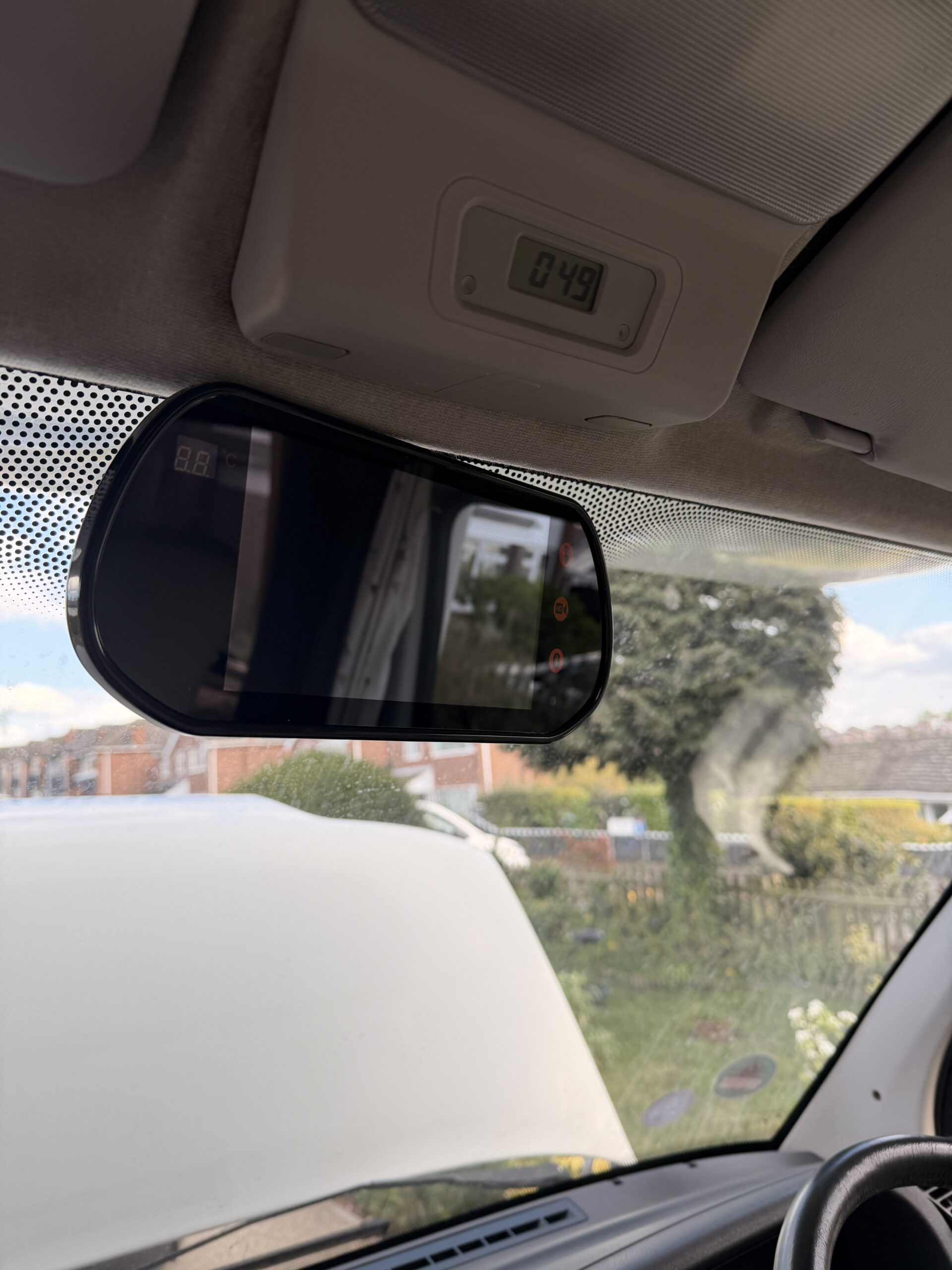 Reversing camera monitor fitted to motorhome cab — live rear view display